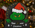 Grinch Christmas countdown with numbered rotating wheel and Days until Christmas display